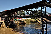 Inle Lake Myanmar. All the buildings are constructed on piles. Residents travel around by canoe, but there are also bamboo walkways and bridges over the canals, monasteries and stupas. 